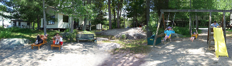 Family beach at Elm Cove Cottages on Georgian Bay