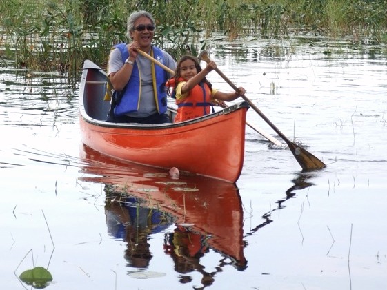 Paddling a Canoe at Elm Cove
