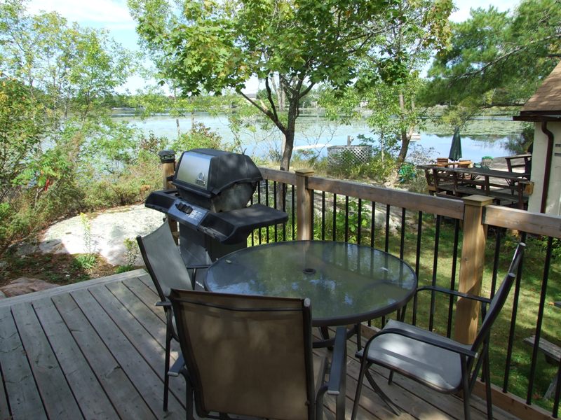 Elm Cove Cottages: #2 deck view to bay & beach